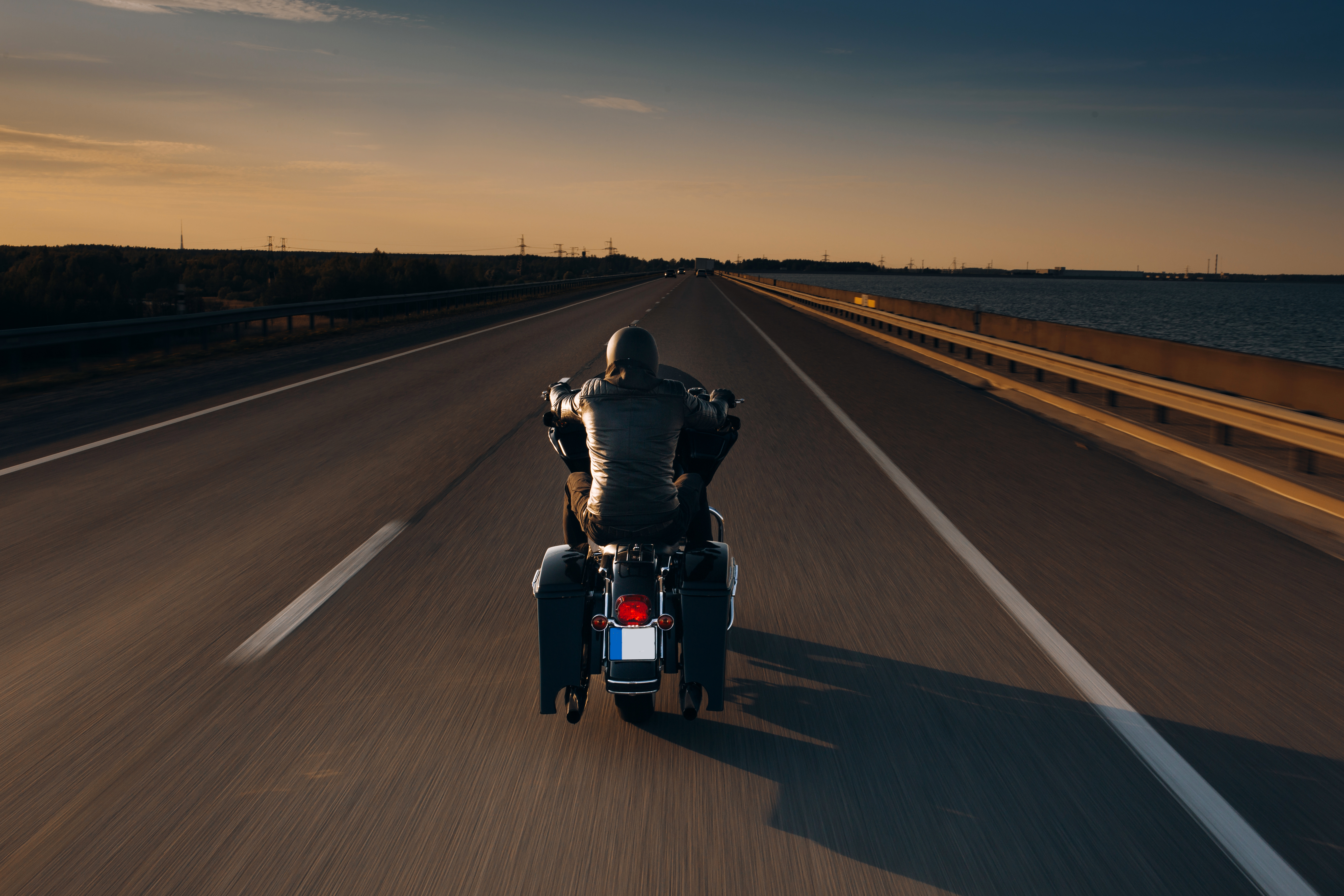 An,Awe-inspiring,Shot,Of,A,Solo,Motorcycle,Rider,Speeding,Along